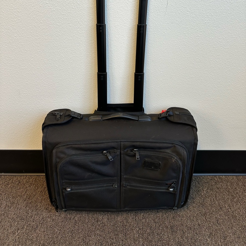 Tumi 2 wheeled garmet bag.